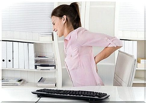 Woman who has a back pain