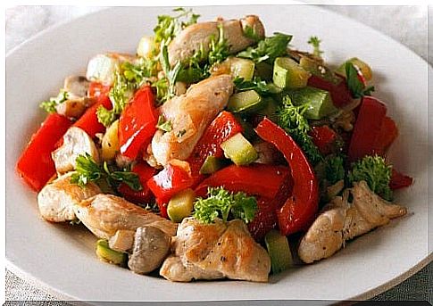 Chicken with vegetables served on a plate