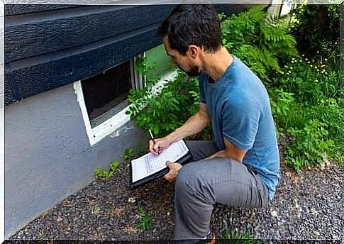 Inspector checking a house