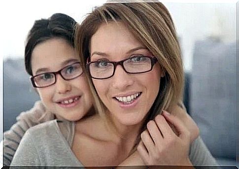 Mother and daughter wearing glasses