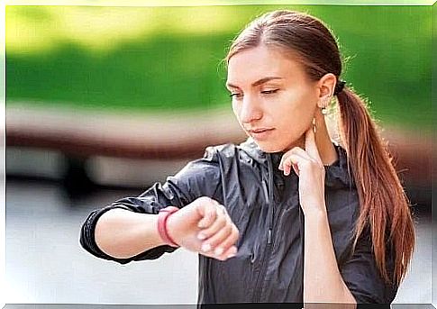 Girl measuring her pulse