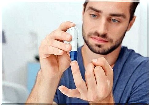 Man measuring his blood sugar